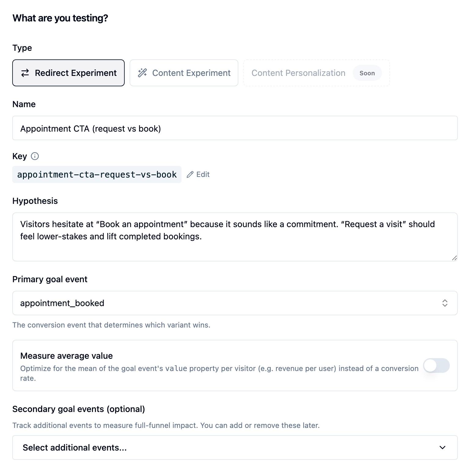 The What are you testing? step of the create-experiment form with the Redirect Experiment type selected, a name of Appointment CTA (request vs book), an auto-generated key, a hypothesis, a Primary goal event set to appointment_booked, a Measure average value toggle switched off, and an empty Secondary goal events picker