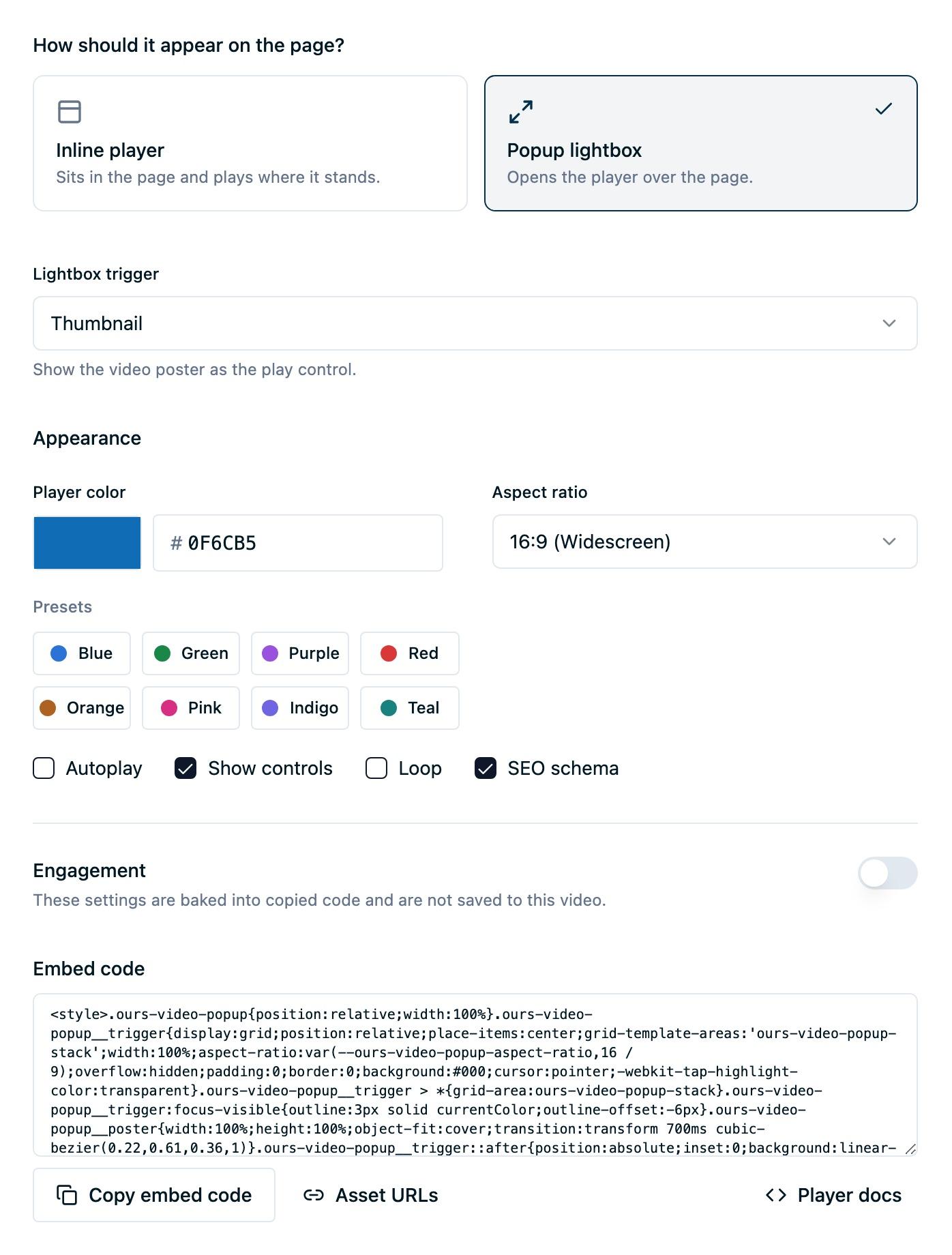 The Embed tab with Popup lightbox selected, the Lightbox trigger menu, player appearance controls, and generated embed code